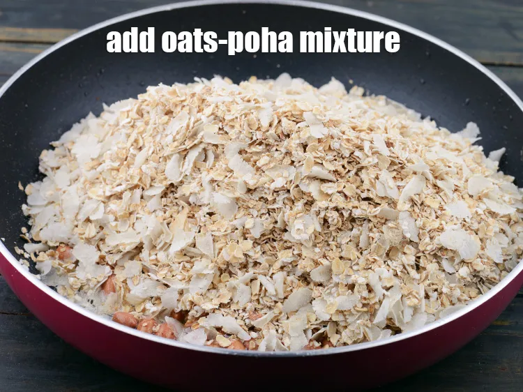 Step 6 – <p>Add the oats-poha mixture.</p>