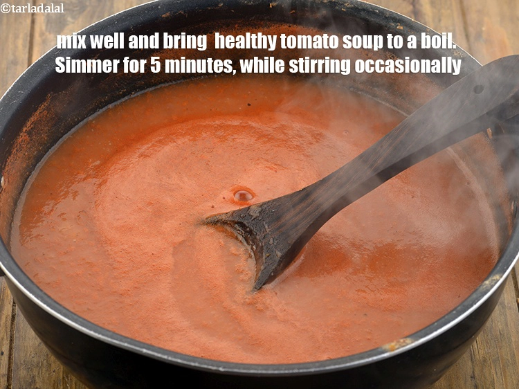 Step 14 – <p>Mix well and bring &nbsp;<strong>healthy tomato soup</strong>&nbsp;to a boil. Simmer for 5 minutes, while stirring …