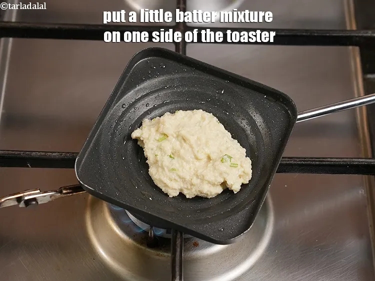 Step 18 – <p>Put a little batter mixture on one side of the toaster.</p>