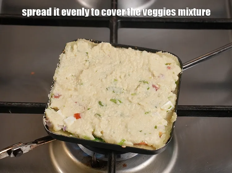 Step 22 – <p>Spread it evenly to cover the veggies mixture.</p>