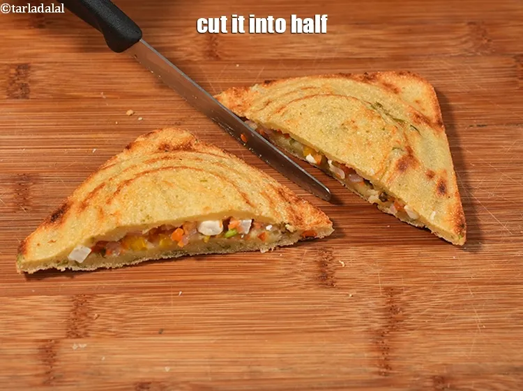 Step 25 – <p>Cut it into half.&nbsp;</p>