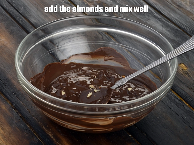 Step 4 – <p style="margin-left:0px;">Add the <a href="https://www.tarladalal.com/glossary-almonds-badam-378i"><u>almond (badam)</u></a> and mix well.</p>