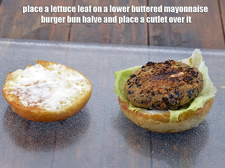 Step 12 – <p><span style="background-color:rgb(255,255,255);color:rgb(0,0,0);">Place a </span><a href="https://www.tarladalal.com/glossary-iceberg-lettuce-iceberg-salad-ke-patte-499i"><u>iceberg lettuce </u></a><span style="background-color:rgb(255,255,255);color:rgb(0,0,0);">leaves on a lower buttered mayonnaise burger bun …