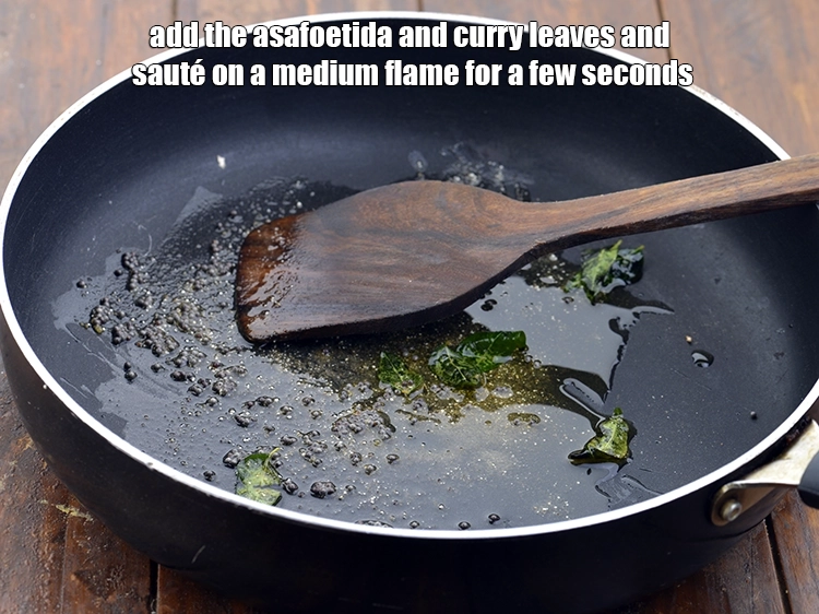 Step 2 – <p><span style="background-color:rgb(255,255,255);color:rgb(0,0,0);">When the seeds crackle, add the </span><a href="https://www.tarladalal.com/glossary-asafoetida-hing-113i"><u>asafoetida (hing)</u></a><span style="background-color:rgb(255,255,255);color:rgb(0,0,0);"> and </span><a href="https://www.tarladalal.com/glossary-curry-leaves-kadi-patta-kadipatta-388i"><u>curry leaves …