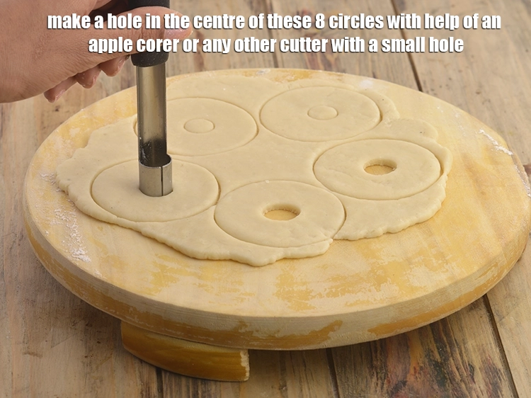 Step 8 – <p><span style="background-color:rgb(255,255,255);color:rgb(0,0,0);">Make a hole in the centre of these 8 circles with help of an …