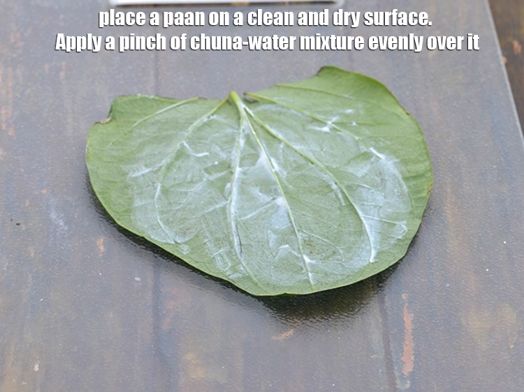 Step 3 – <p><span style="background-color:rgb(255,255,255);color:rgb(0,0,0);">Place a </span><a href="https://www.tarladalal.com/glossary-betel-leaves-paan-paan-ke-patte-561i"><u>betel leaves (paan)</u></a><span style="background-color:rgb(255,255,255);color:rgb(0,0,0);"> on a clean and dry surface. Apply …