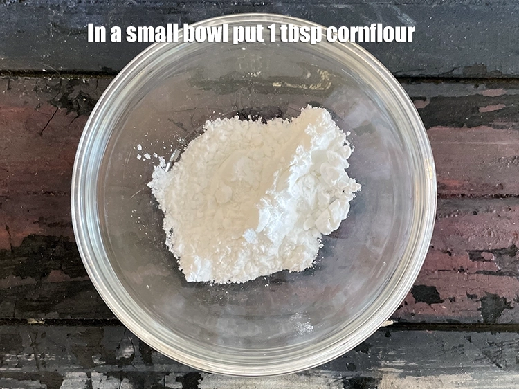 Step 1 – <p><span style="background-color:rgb(255,255,255);color:rgb(0,0,0);">In a small bowl put&nbsp;1 tbsp&nbsp;</span><a href="https://www.tarladalal.com/glossary-cornflour-cornstarch-maize-starch-corn-flour-112i"><u>cornflour</u></a>.</p>