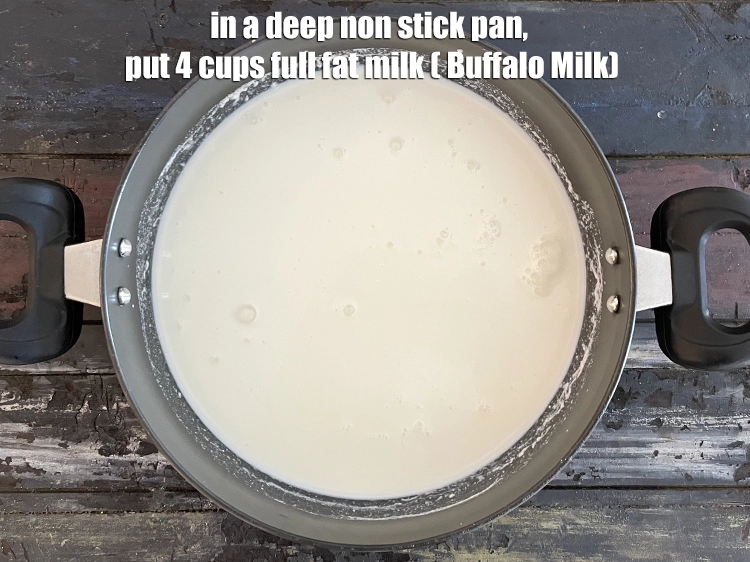 Step 5 – <p><span style="background-color:rgb(255,255,255);color:rgb(0,0,0);">In a deep non stick pan, put&nbsp;4 cups full fat </span><a href="https://www.tarladalal.com/glossary-milk-doodh-full-cream-milk-514i"><u>milk</u></a><span style="background-color:rgb(255,255,255);color:rgb(0,0,0);">&nbsp;( Buffalo …