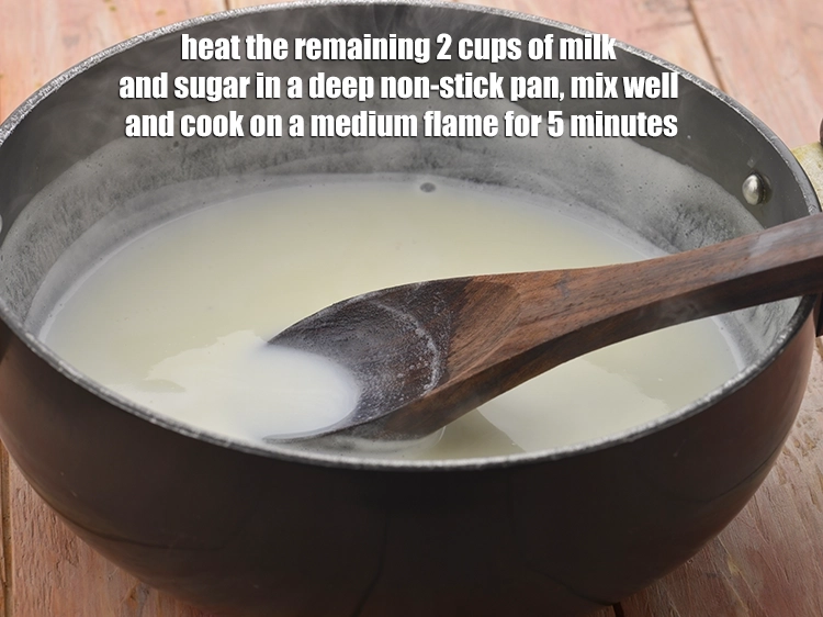 Step 2 – <p><span style="background-color:rgb(255,255,255);color:rgb(0,0,0);">Heat the remaining 2 cups of </span><a href="https://www.tarladalal.com/glossary-milk-doodh-full-cream-milk-514i"><u>milk</u></a><span style="background-color:rgb(255,255,255);color:rgb(0,0,0);"> and </span><a href="https://www.tarladalal.com/glossary-sugar-chini-shakkar-278i"><u>sugar</u></a><span style="background-color:rgb(255,255,255);color:rgb(0,0,0);"> in …