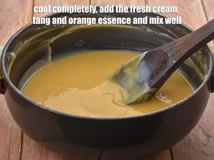 Step 4 – <p><span style="background-color:rgb(255,255,255);color:rgb(0,0,0);">Cool completely, add the </span><a href="https://www.tarladalal.com/glossary-fresh-cream-1877i"><u>fresh cream</u></a><span style="background-color:rgb(255,255,255);color:rgb(0,0,0);">, </span><a href="https://www.tarladalal.com/glossary-orange-narangi-santra-114i"><u>orange</u><strong><u> </u></strong></a><span style="background-color:rgb(255,255,255);color:rgb(0,0,0);">flavoured </span><a href="https://tarladalal.com/glossary-tang-1550i"><u>tang</u></a><span …