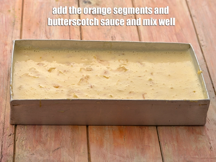 Step 7 – <p><span style="background-color:rgb(255,255,255);color:rgb(0,0,0);">Add the </span><a href="https://www.tarladalal.com/glossary-orange-narangi-santra-114i#ing_3032"><u>chopped orange</u></a><span style="background-color:rgb(255,255,255);color:rgb(0,0,0);"> segments and </span><a href="https://www.tarladalal.com/butterscotch-sauce-3990r"><u>butterscotch sauce</u></a><span style="background-color:rgb(255,255,255);color:rgb(0,0,0);"> and mix …