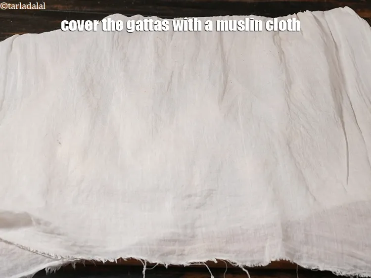 Step 16 – <p>Cover the gattas with a muslin cloth and keep aside.</p>