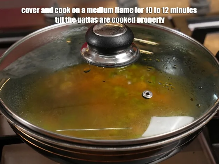 Step 36 – <p><span style="color:rgb(0,0,0);">Cover and cook on a medium flame for 10 to 12 minutes till the …