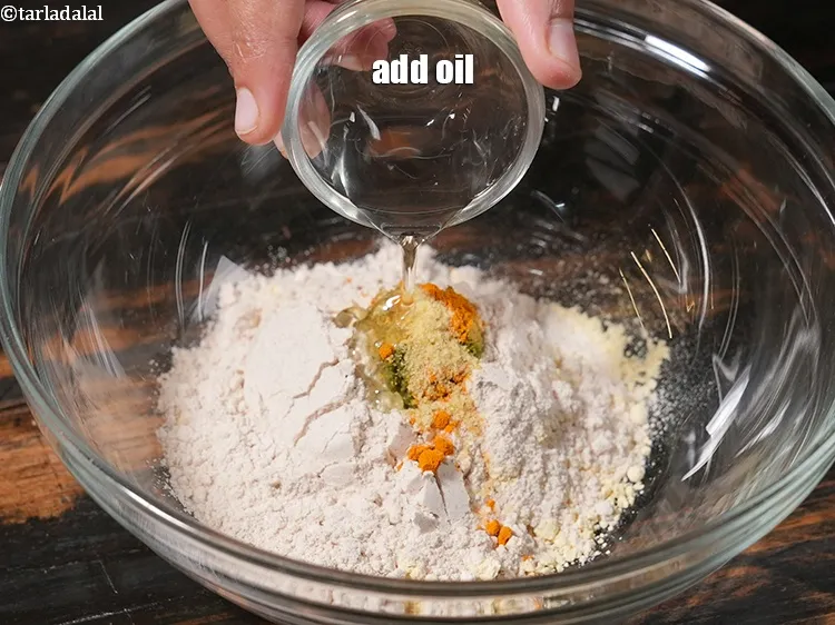 Step 9 – <p>Add 1 tsp <a href="https://www.tarladalal.com/glossary-oil-671i">oil</a>.</p>