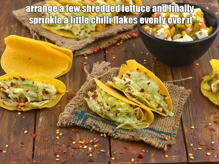 Step 12 – <p><span style="background-color:rgb(255,255,255);color:rgb(0,0,0);">Arrange a few </span><a href="https://www.tarladalal.com/glossary-iceberg-lettuce-iceberg-salad-ke-patte-499i#ing_2568"><u>shredded iceberg lettuce</u></a><span style="background-color:rgb(255,255,255);color:rgb(0,0,0);"> and finally sprinkle a little </span><a …