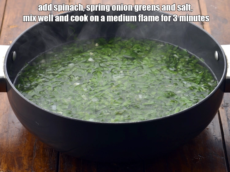 Step 14 – <p><span style="background-color:rgb(255,255,255);color:rgb(0,0,0);">Add the 2 cups </span><a href="https://www.tarladalal.com/glossary-spinach-palak-255i#ing_2360"><u>shredded spinach (palak)</u></a><span style="background-color:rgb(255,255,255);color:rgb(0,0,0);">, 1/2 cup </span><a href="https://www.tarladalal.com/glossary-spring-onion-greens-hare-pyaz-ke-patte-445i#ing_2424"><u>chopped spring …