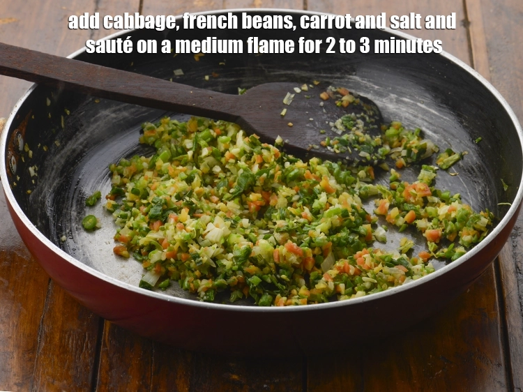 Step 3 – <p><span style="background-color:rgb(255,255,255);color:rgb(0,0,0);">Add the 1/4 cup finely </span><a href="https://www.tarladalal.com/glossary-cabbage-patta-gobi-kobi-248i#ing_2363"><u>chopped cabbage</u></a><span style="background-color:rgb(255,255,255);color:rgb(0,0,0);">, 1/4 cup finely </span><a href="https://www.tarladalal.com/glossary-French-beans-fansi-196i#ing_2375"><u>chopped …