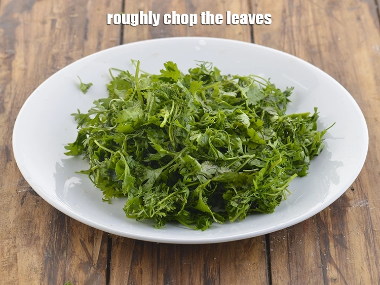 Step 8 – <p>Roughly chop the leaves for the green chutney. We will need approximately 1 cup of …