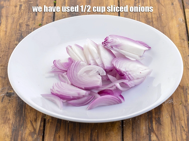 Step 9 – <p>We have also added <span style="background-color:rgb(255,255,255);color:rgb(0,0,0);">1 large </span><a href="https://www.tarladalal.com/glossary-onions-pyaz-pyaaz-kanda-548i#ing_2342"><u>sliced onions</u></a> in this recipe to make …