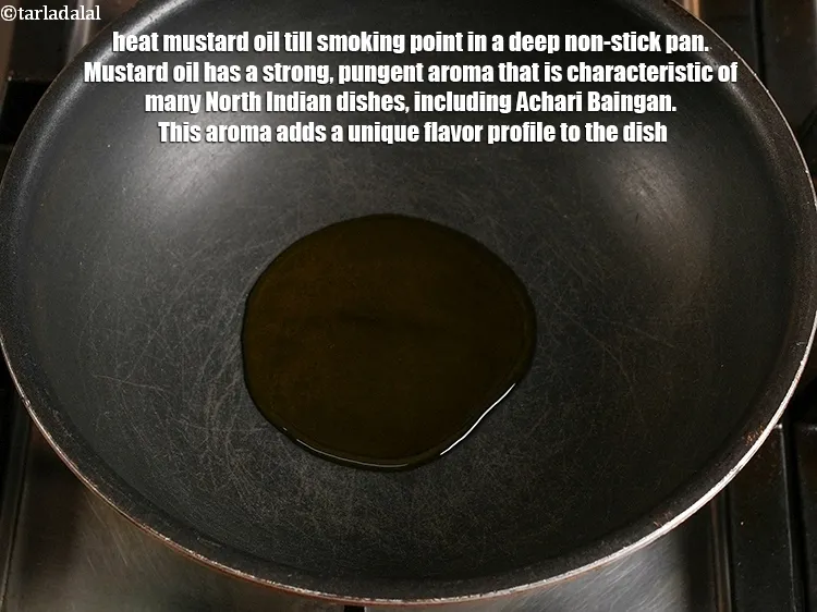 Step 18 – <p>Heat 2 tbsp <a href="https://www.tarladalal.com/glossary-mustard-oil-rai-ka-tel-sarson-ka-tel-942i">mustard (rai / sarson) oil</a> till smoking point in a deep …