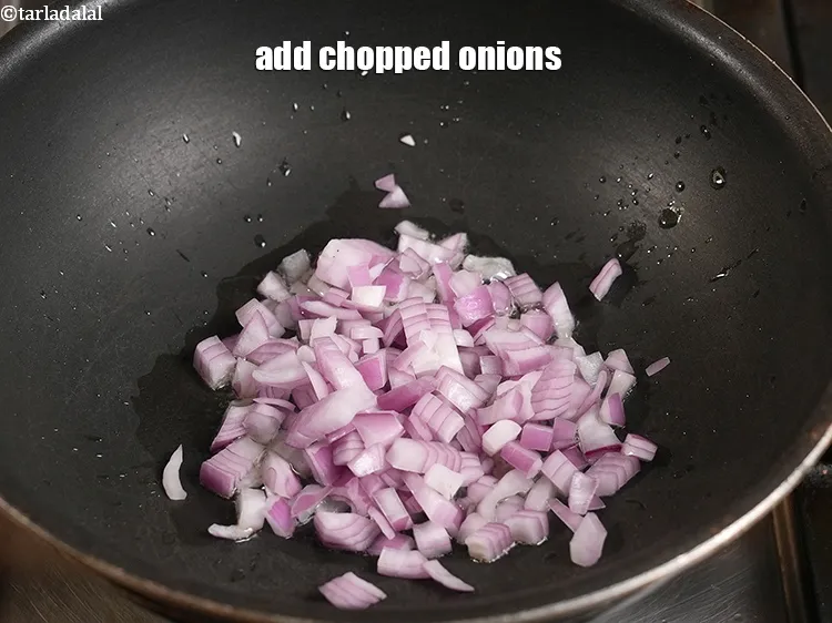 Step 24 – <p>Add ½ cup <a href="https://www.tarladalal.com/glossary-chopped-onions-722i">chopped onions</a>.</p>