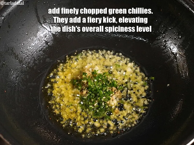 Step 25 – <p>Add 1 tsp finely <a href="https://www.tarladalal.com/glossary-chopped-green-chilli-820i">chopped green chillies</a>. They add a fiery kick, elevating the …