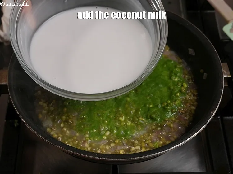 Step 32 – <p>Add the 1½ cups <a href="https://www.tarladalal.com/glossary-coconut-milk-nariyal-ka-doodh-861i">coconut milk (nariyal ka doodh)</a>.</p>