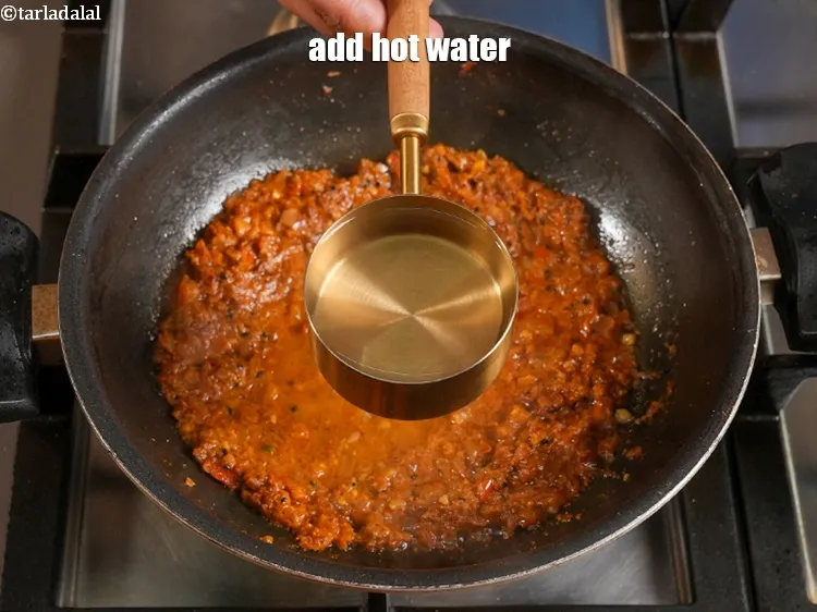 Step 34 – <p>Add ½ cup hot water.</p>