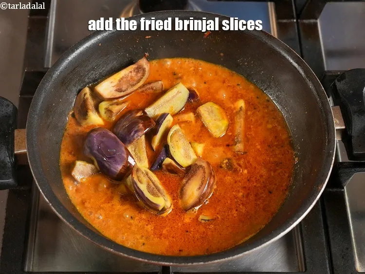 Step 35 – <p>Add the fried brinjal slices.</p>