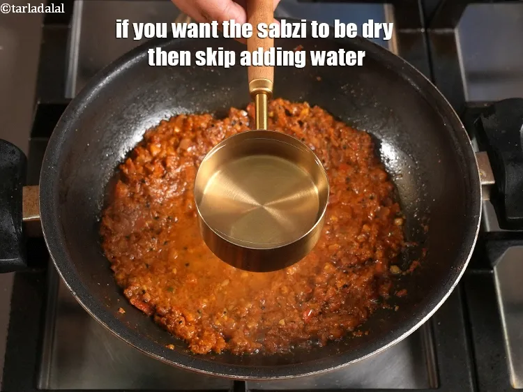 Step 42 – <p>If you want the sabzi to be dry then skip adding water.&nbsp;</p>