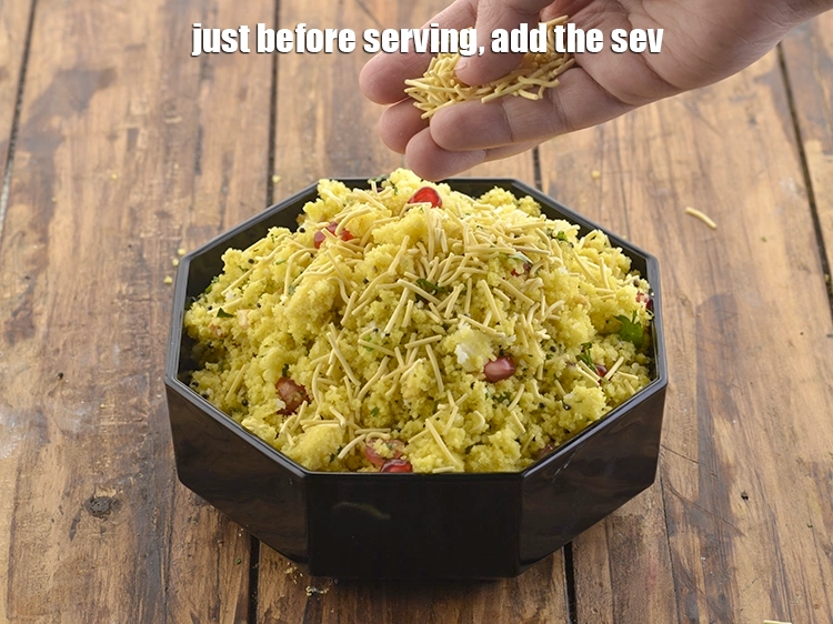 Step 11 – <p>Just before serving, add the <span style="background-color:rgb(255,255,255);color:rgb(0,0,0);">3 tbsp </span><a href="https://www.tarladalal.com/glossary-sev-1137i"><u>sev</u></a> to&nbsp;<strong>amiri khaman | Gujarati sev …