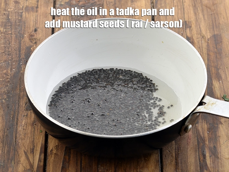 Step 2 – <p>Heat the <span style="background-color:rgb(255,255,255);color:rgb(0,0,0);">1 tbsp </span><a href="https://www.tarladalal.com/glossary-oil-671i"><u>oil</u></a> in a kadhai or tadka pan and add …