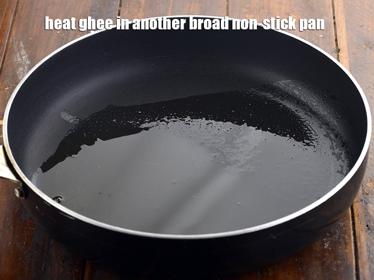 Step 4 – <p><span style="background-color:rgb(255,255,255);color:rgb(0,0,0);">Heat the 1 tbsp </span><a href="https://www.tarladalal.com/glossary-ghee-245i"><u>ghee</u></a><span style="background-color:rgb(255,255,255);color:rgb(0,0,0);"> in another broad non-stick pan.</span></p>