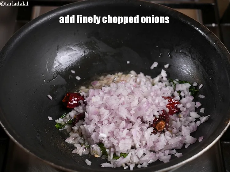 Step 15 – <p><span style="color:rgb(0,0,0);">Add&nbsp;1/2 cup&nbsp;finely&nbsp;</span><a href="https://www.tarladalal.com/glossary-chopped-onions-722i">chopped onions</a><span style="color:rgb(0,0,0);">.</span></p>