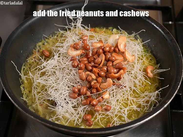 Step 25 – <p><span style="background-color:rgb(255,255,255);color:rgb(0,0,0);">Add the fried peanuts and cashews and salt to taste.</span></p>