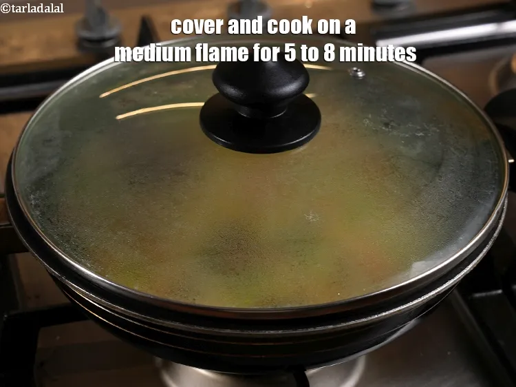 Step 28 – <p><span style="color:rgb(0,0,0);">Cover and cook on a medium flame for 5 to 8 minutes, while stirring …