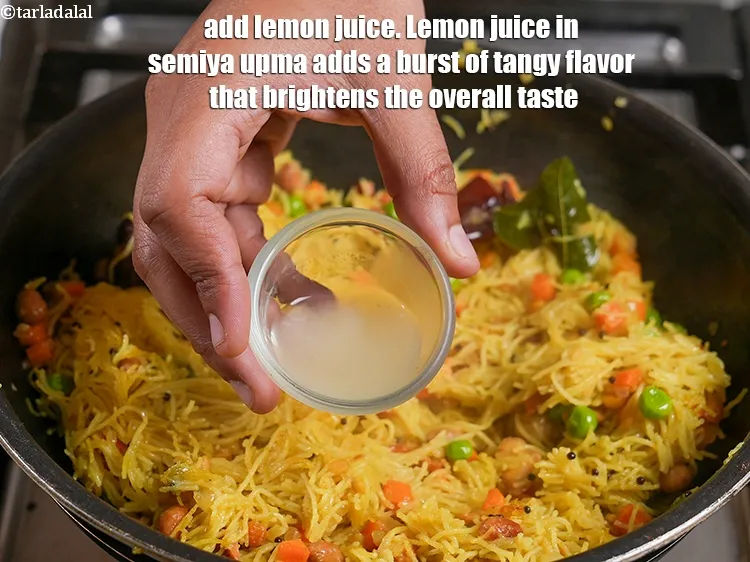 Step 33 – <p><span style="color:rgb(0,0,0);">Add ½ tbsp </span><a href="https://www.tarladalal.com/glossary-lemon-juice-numbi-ka-ras-nimbu-ka-juice-471i">lemon juice</a><span style="color:rgb(0,0,0);">. Lemon juice in semiya upma adds a …