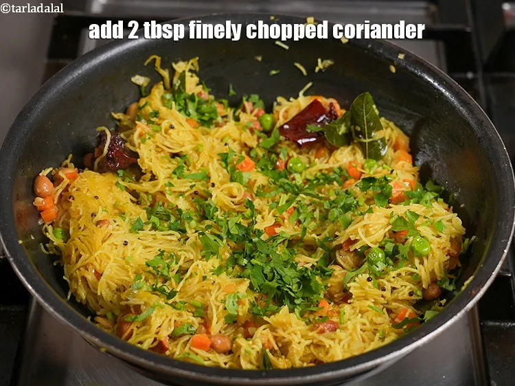 Step 34 – <p><span style="color:rgb(0,0,0);">Add 2 tbsp finely&nbsp;</span><a href="https://www.tarladalal.com/glossary-chopped-coriander-783i">chopped coriander (dhania)</a><span style="color:rgb(0,0,0);">.</span></p>