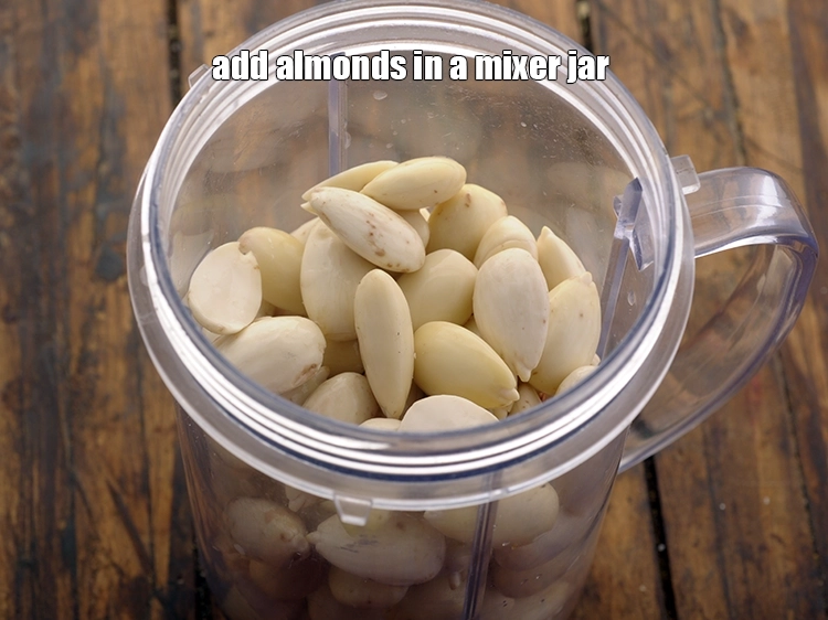 Step 4 – <p><span style="background-color:rgb(255,255,255);color:rgb(0,0,0);">Add 1 cup </span><a href="https://www.tarladalal.com/glossary-almonds-badam-378i"><u>almond (badam)</u></a><span style="background-color:rgb(255,255,255);color:rgb(0,0,0);"> in a mixer jar.</span></p>
