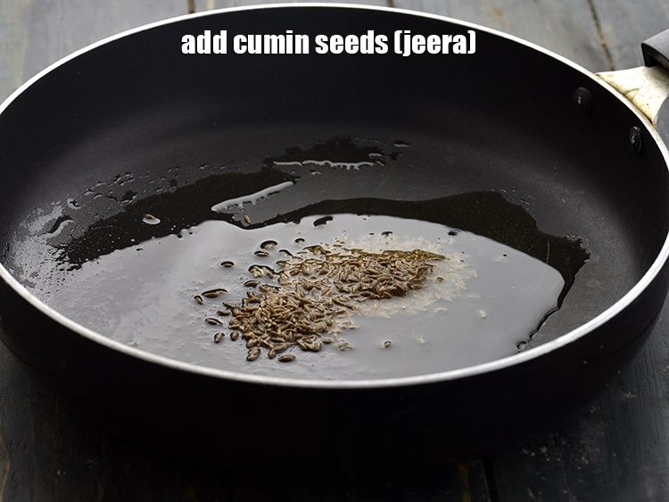 Step 2 – <p><span style="background-color:rgb(255,255,255);color:rgb(0,0,0);">Add the 1/2 tsp </span><a href="https://www.tarladalal.com/glossary-cumin-seeds-jeera-zeera-381i"><u>cumin seeds (jeera)</u></a><span style="background-color:rgb(255,255,255);color:rgb(0,0,0);">.</span></p>