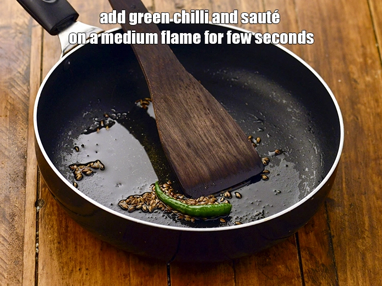 Step 4 – <p><span style="background-color:rgb(255,255,255);color:rgb(0,0,0);">Add the </span><a href="https://www.tarladalal.com/glossary-green-chillies-hari-mirch-331i#ing_3504"><u>green chillies</u></a><span style="background-color:rgb(255,255,255);color:rgb(0,0,0);">, and sauté on a medium flame for few …