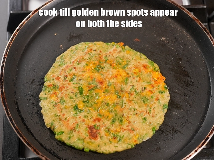 Step 7 – <p>Cook <span style="background-color:rgb(255,255,255);color:rgb(0,0,0);">till golden brown spots appear on both the sides.</span></p>