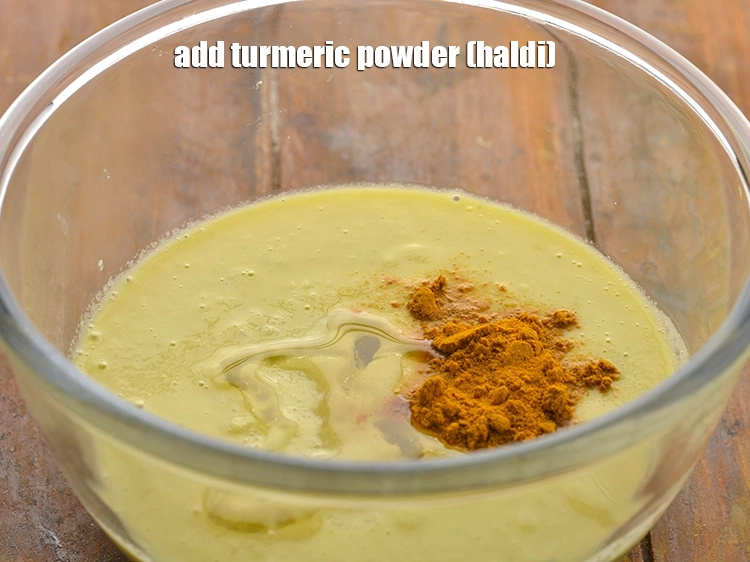 Step 12 – <p><span style="background-color:rgb(255,255,255);color:rgb(0,0,0);">Add the 1 tbsp </span><a href="https://www.tarladalal.com/glossary-oil-671i"><u>oil</u></a><span style="background-color:rgb(255,255,255);color:rgb(0,0,0);">, 1/2 tsp </span><a href="https://www.tarladalal.com/glossary-turmeric-powder-haldi-645i"><u>turmeric powder (haldi)</u></a><span style="background-color:rgb(255,255,255);color:rgb(0,0,0);">. …