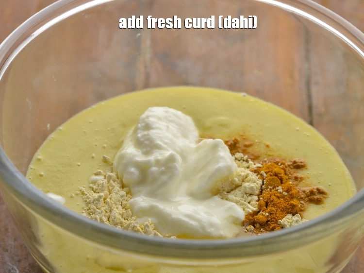 Step 14 – <p><span style="background-color:rgb(255,255,255);color:rgb(0,0,0);">Add the 2 tbsp </span><a href="https://www.tarladalal.com/glossary-curd-dahi-yogurt-yoghurt-383i"><u>curd (dahi)</u></a><span style="background-color:rgb(255,255,255);color:rgb(0,0,0);">. We have used fresh </span><a href="https://www.tarladalal.com/Basic-Homemade-Curd-Dahi-Or-Yogurt-Using-Cows-Milk-42457r"><u>homemade …