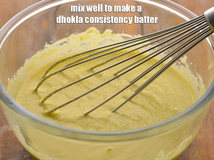 Step 33 – <p><span style="background-color:rgb(255,255,255);color:rgb(0,0,0);">Mix well to make a dhokla consistency batter. The best part about the moong …
