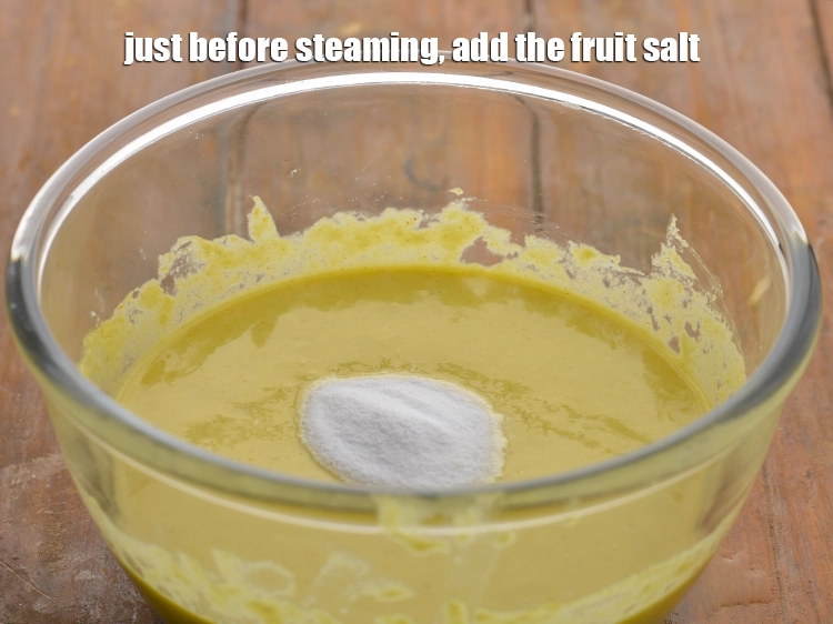 Step 16 – <p>Just before steaming, sprinkle <span style="background-color:rgb(255,255,255);color:rgb(0,0,0);">1 1/2 tsp </span><a href="https://www.tarladalal.com/glossary-salt-namak-table-salt-418i#ing_2803"><u>fruit salt</u></a>. After adding the fruit …