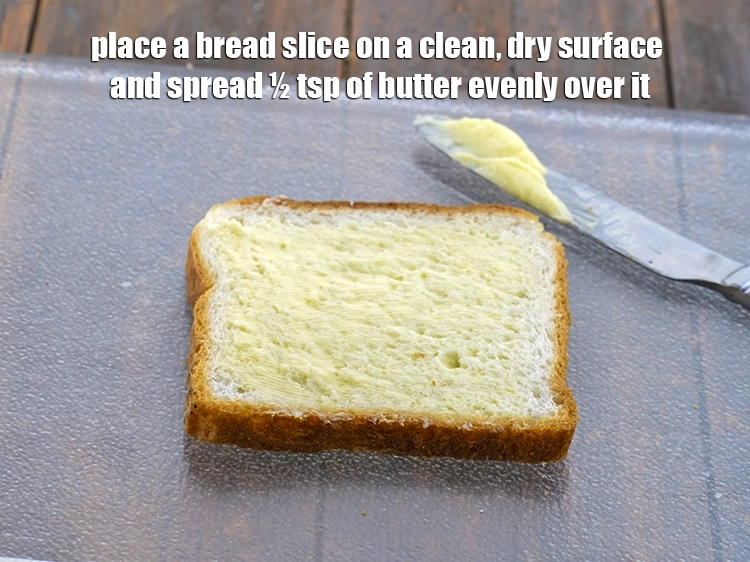 Step 9 – <p><span style="background-color:rgb(255,255,255);color:rgb(0,0,0);">Place a </span><a href="https://www.tarladalal.com/glossary-bread-219i"><u>bread </u></a><span style="background-color:rgb(255,255,255);color:rgb(0,0,0);">slices on a clean, dry surface and spread ½ …