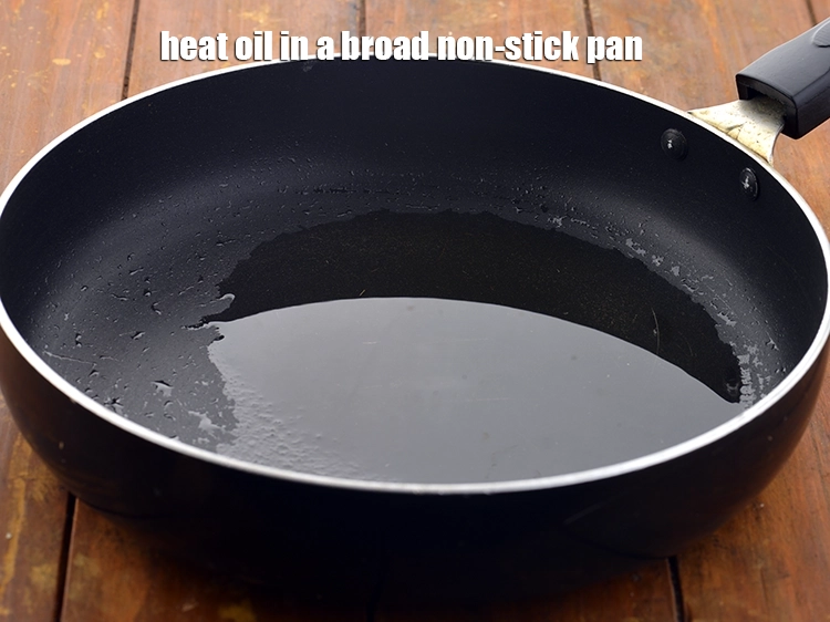 Step 1 – <p><span style="background-color:rgb(255,255,255);color:rgb(0,0,0);">Heat the 1 tbsp </span><a href="https://www.tarladalal.com/glossary-oil-671i"><u>oil</u></a><span style="background-color:rgb(255,255,255);color:rgb(0,0,0);"> in a broad non-stick pan.</span></p>
