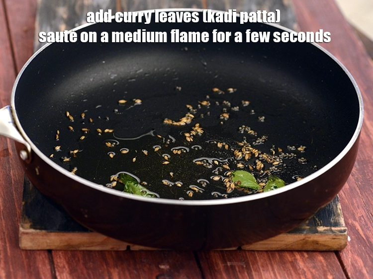 Step 4 – <p>Add <span style="background-color:rgb(255,255,255);color:rgb(0,0,0);">4 to 6 </span><a href="https://www.tarladalal.com/glossary-curry-leaves-kadi-patta-kadipatta-388i"><u>curry leaves (kadi patta)</u></a><u>. </u><span style="background-color:rgb(255,255,255);color:rgb(0,0,0);">sauté on a medium …