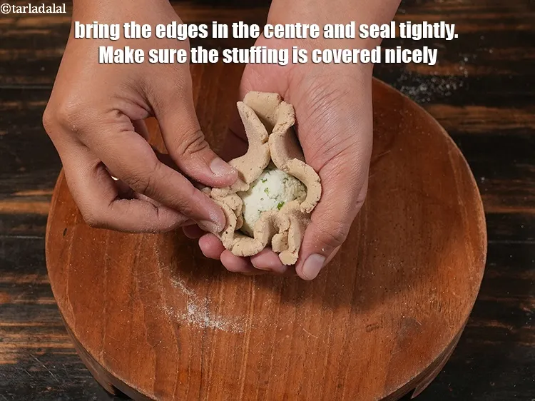 Step 20 – <p>Bring the edges in the centre and seal tightly. Make sure the stuffing is covered …